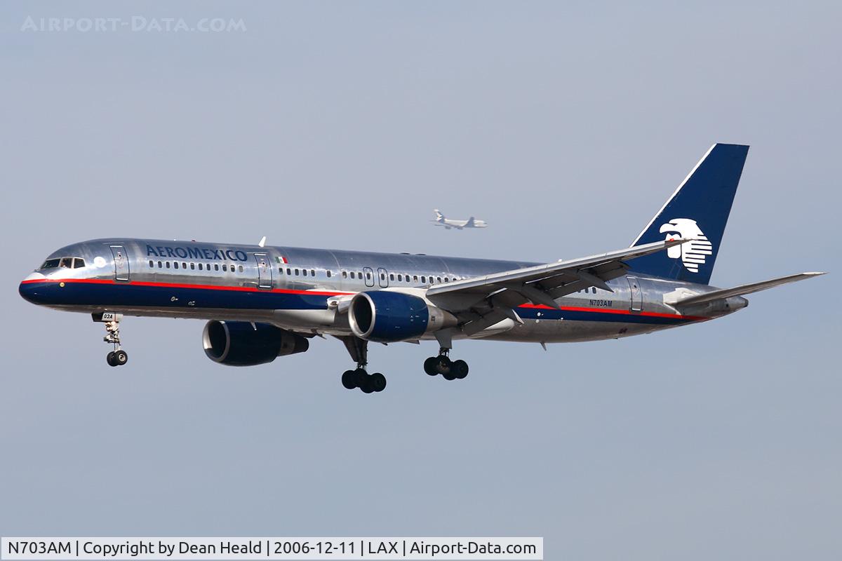 N703AM, 1993 Boeing 757-29J C/N 27203, AeroMexico N703AM (FLT AMX646) from Mexico City (MMMX) on short-final to RWY 25R. In the background is Cathay Pacific (FLT CPA882) from Hong Kong on downwind to RWY 24R.