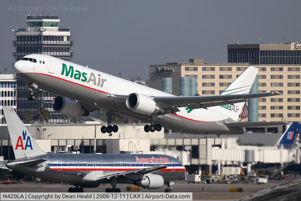 N420LA, 2006 Boeing 767-316F C/N 34627, Mas Air N420LA departing RWY 25R, with AAL4 taxiing for departure to JFK.