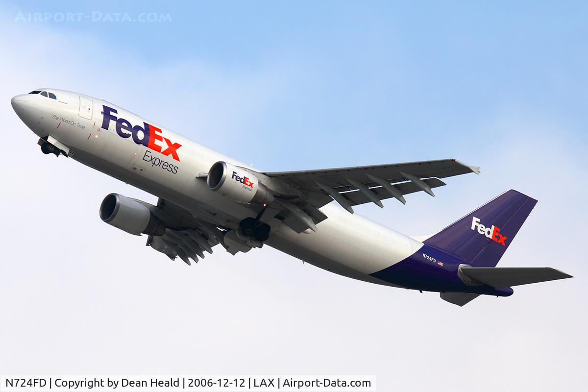 N724FD, 1989 Airbus A300B4-622R C/N 530, The sun was hiding behind some high clouds as FedEx N724FD (FLT FDX3068) climbs out from RWY 25R enroute to Rickenbacker Int'l (KLCK) - Columbus, Ohio.