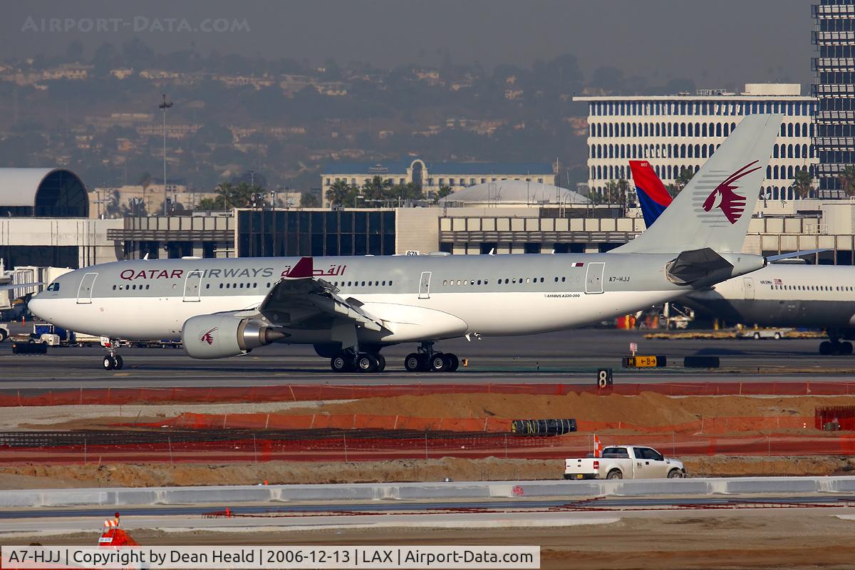 A7-HJJ, 2002 Airbus A330-203 C/N 487, Qatar Airways A7-HJJ exitting RWY 25R.