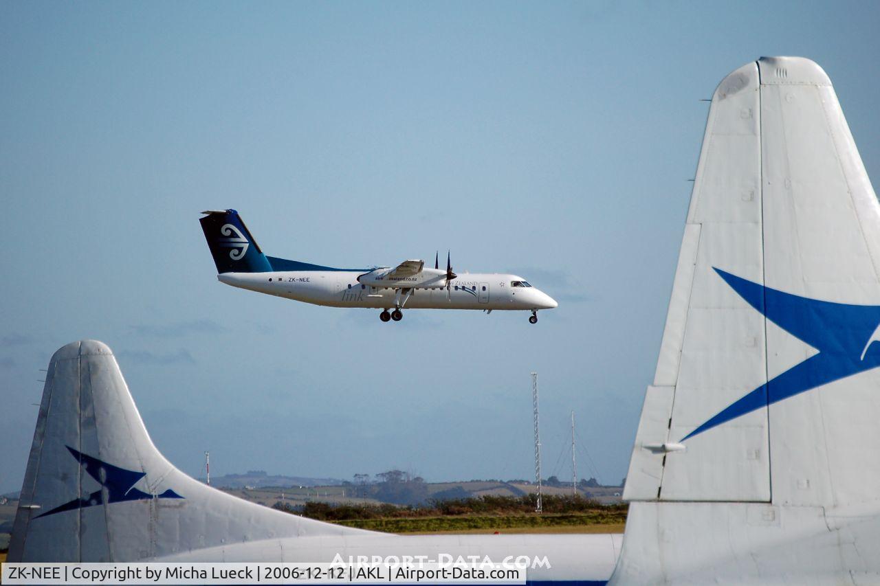 ZK-NEE, 2005 De Havilland Canada DHC-8-311 Dash 8 C/N 618, on short finals, between two Convair tails