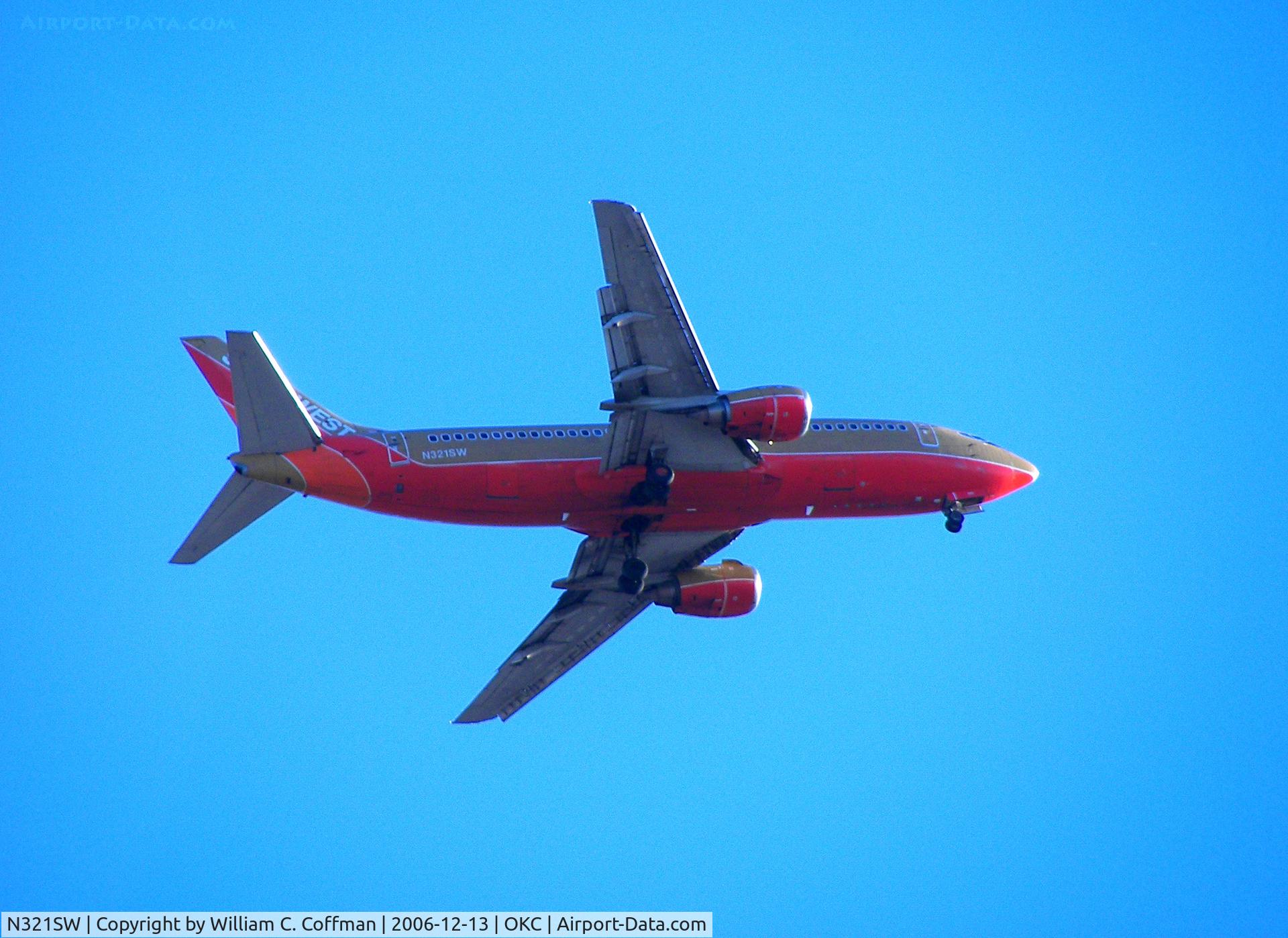 N321SW, 1987 Boeing 737-3H4 C/N 23342, Flying over OKC Fairgrounds towards Will Rogers World Airport