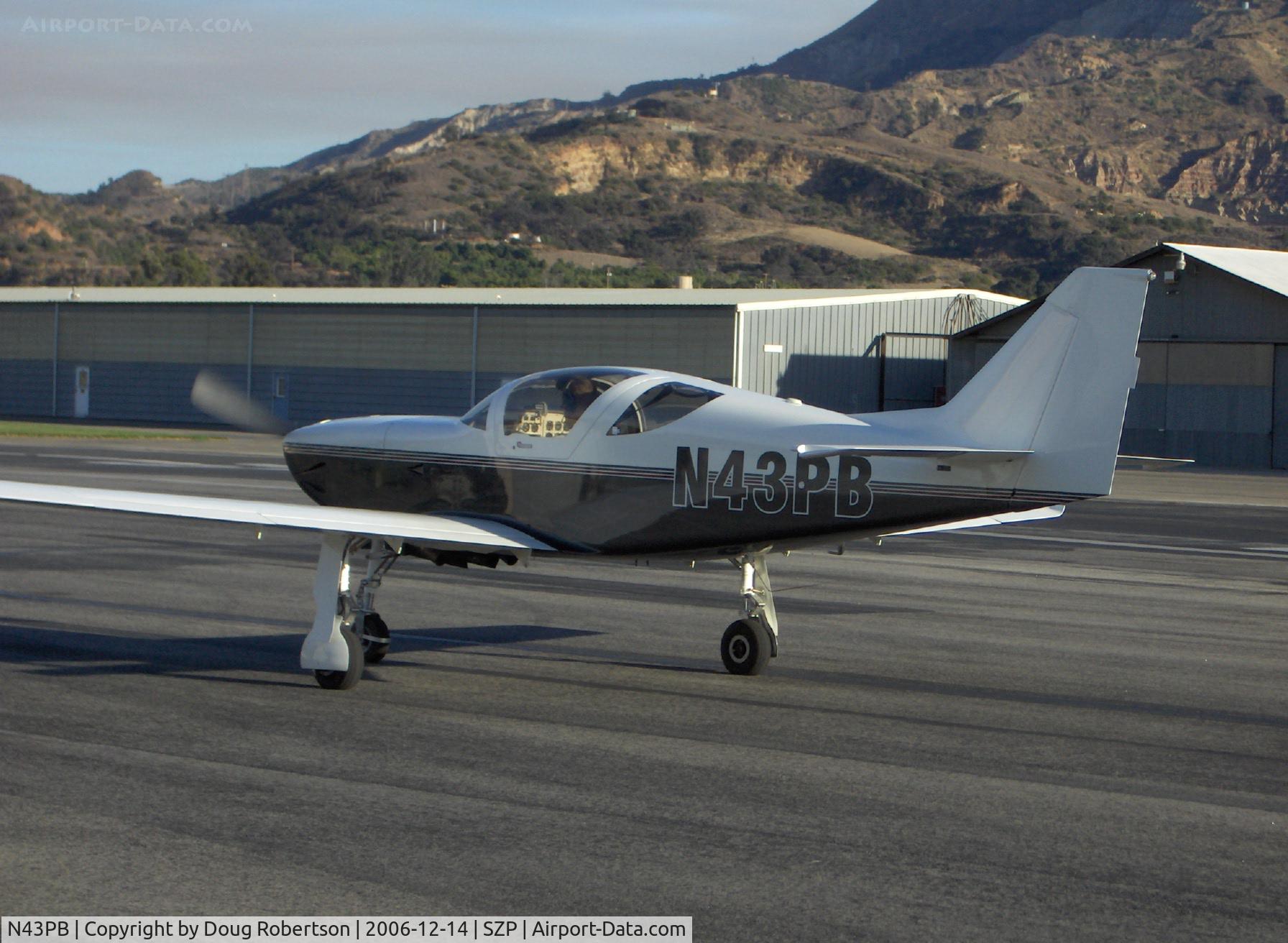 N43PB, 2001 Stoddard-Hamilton Glasair III C/N 3306, 2001 Broen GLASAIR III, Lycoming IO-540, taxi to Rwy 22, mountain fire smoke in distance