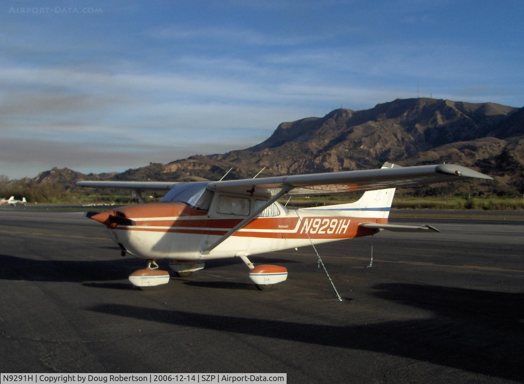 N9291H, 1975 Cessna 172M C/N 17266071, 1975 Cessna 172M SKYHAWK II, Lycoming O-320-E2D, mountain fire smoke in distance