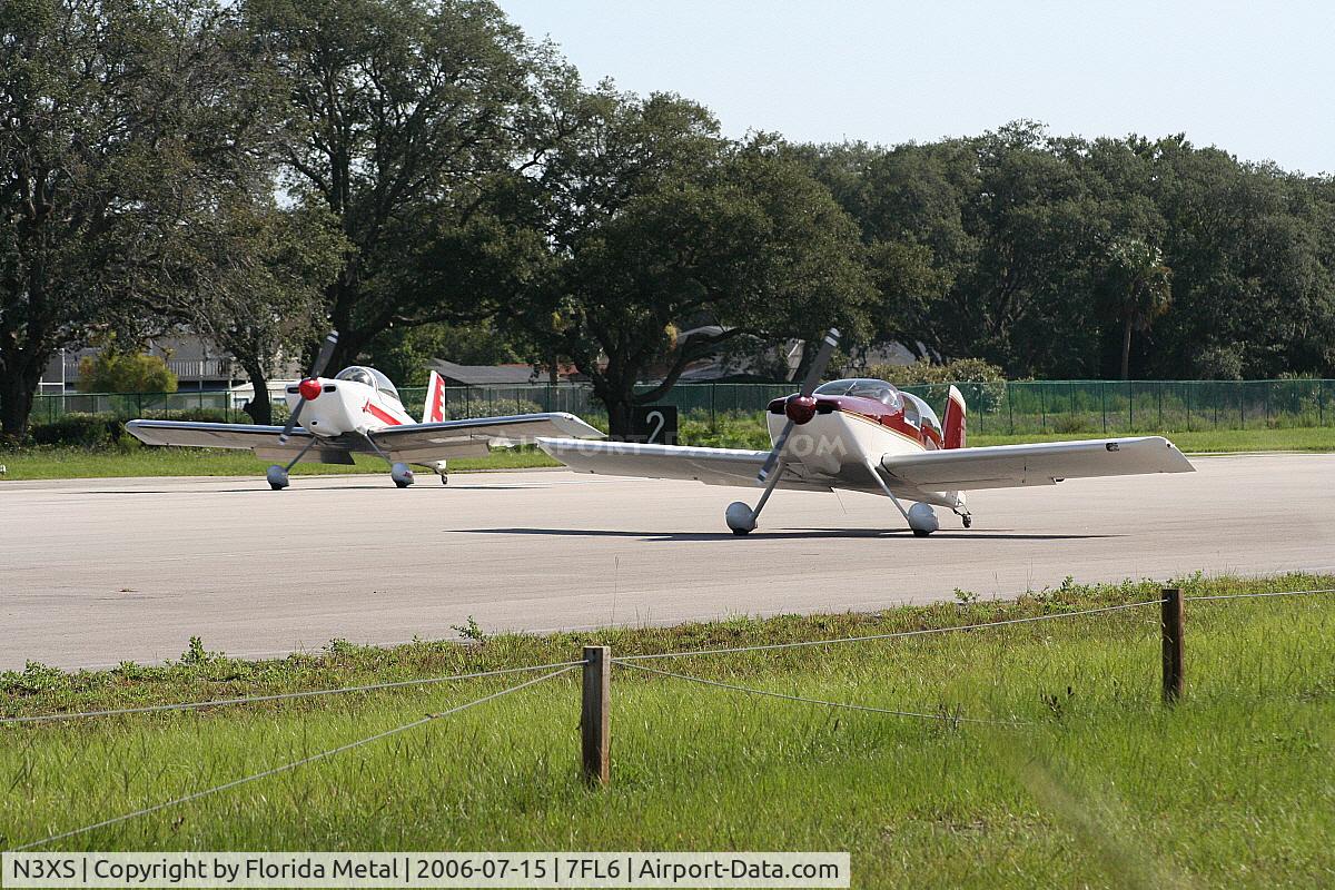 N3XS, 1996 Vans RV-8 C/N C001, landing at Spruce Creek