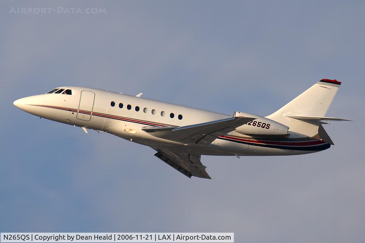 N265QS, 2001 Dassault Falcon 2000 C/N 165, NetJets Aviation Dassult Falcon 2000 climbing out from RWY 25R late in the afternoon.