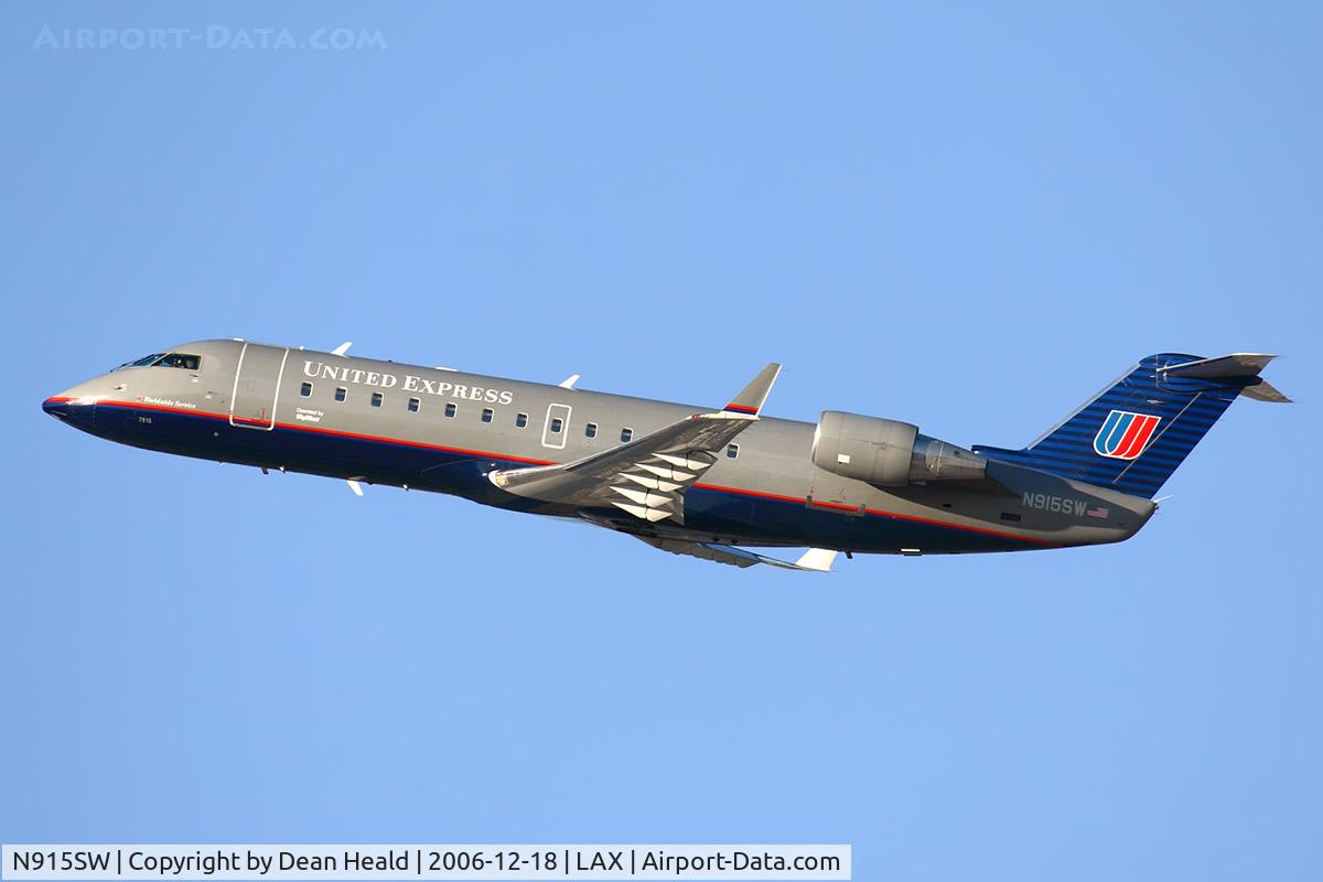 N915SW, 2002 Bombardier CRJ-200LR (CL-600-2B19) C/N 7615, United Express (SkyWest Airlines) N915SW (FLT SKW6474) climbing out from RWY 25R enroute to Albuquerque Sunport Int'l (KABQ).