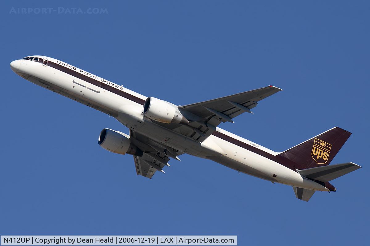 N412UP, 1988 Boeing 757-24APF C/N 23852, United Parcel Service N412UP (FLT UPS4911) climbing out from RWY 25R enroute to Dallas Fort Worth Int'l (KDFW), carrying many holiday gifts, I'm sure.