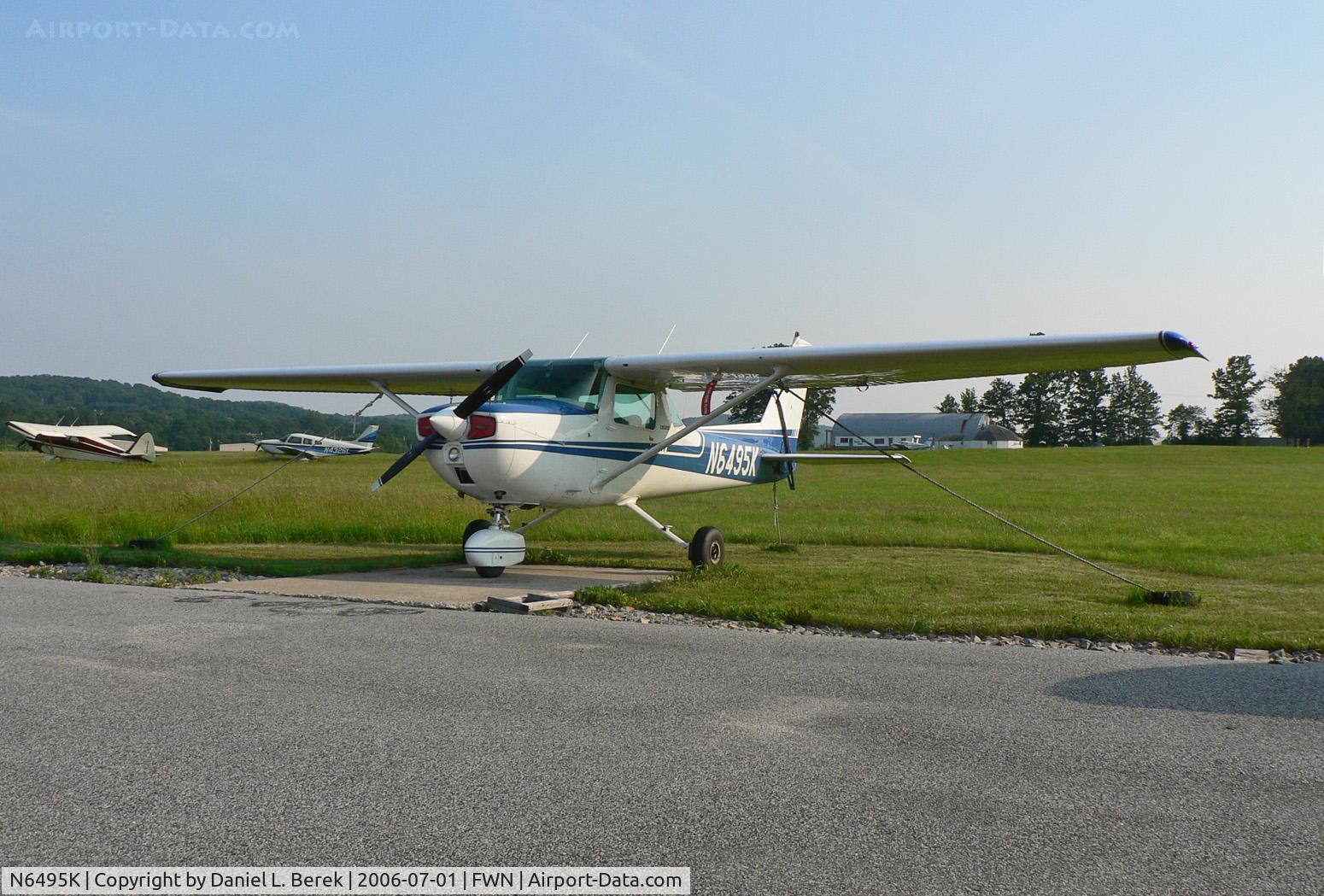 N6495K, 1975 Cessna 150M C/N 15077730, Little 1975 Cessna soaks up the rays at Sussex Airport.