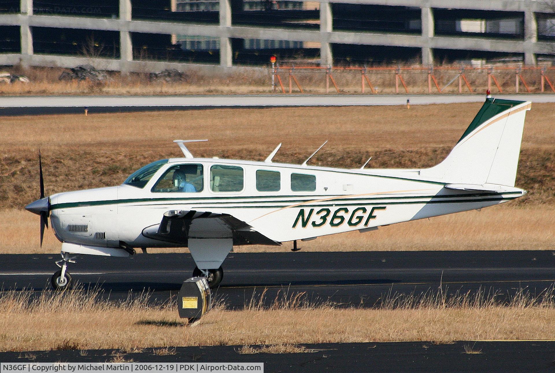 N36GF, 1977 Beech A36 Bonanza 36 C/N E-1168, Taxing to Epps Air Service