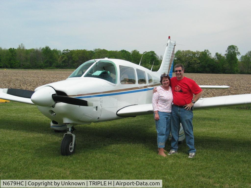 N679HC, 1979 Piper PA-28-181 C/N 28-7990425, On taxi at grass field