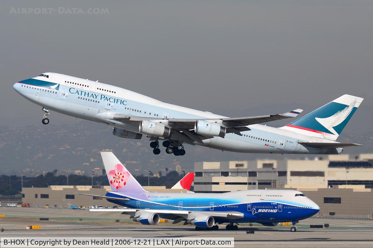 B-HOX, 1991 Boeing 747-467 C/N 24955, Cathay Pacific B-HOX (FLT CPA885) departing RWY 25R enroute to Hong Kong Int'l (VHHH) with China Airlines B-18210 