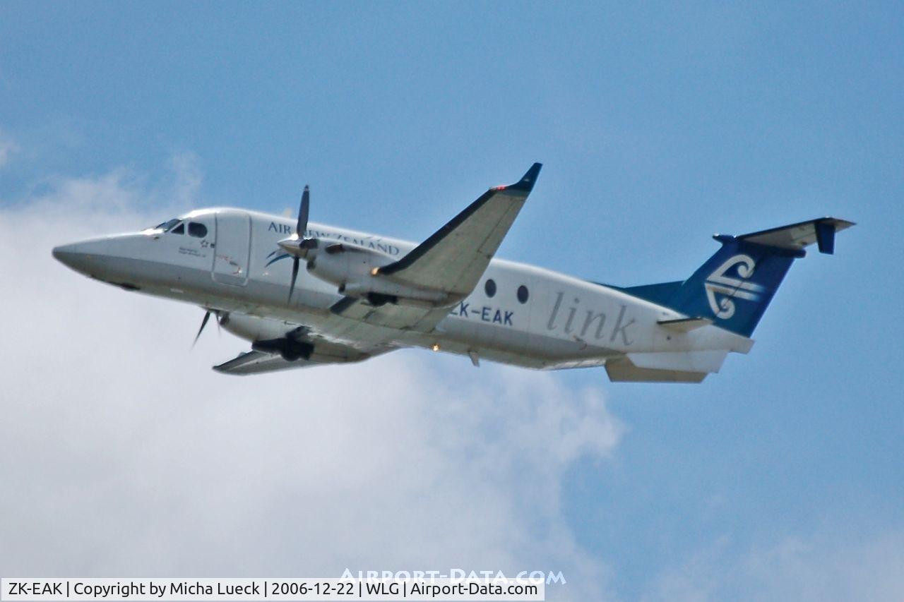 ZK-EAK, 2001 Raytheon 1900D C/N UE-434, Climbing out of Wellington