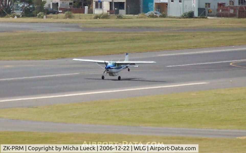 ZK-PRM, Cessna A185F Skywagon 185 C/N 18504414, just landing - tail wheel still up in the air