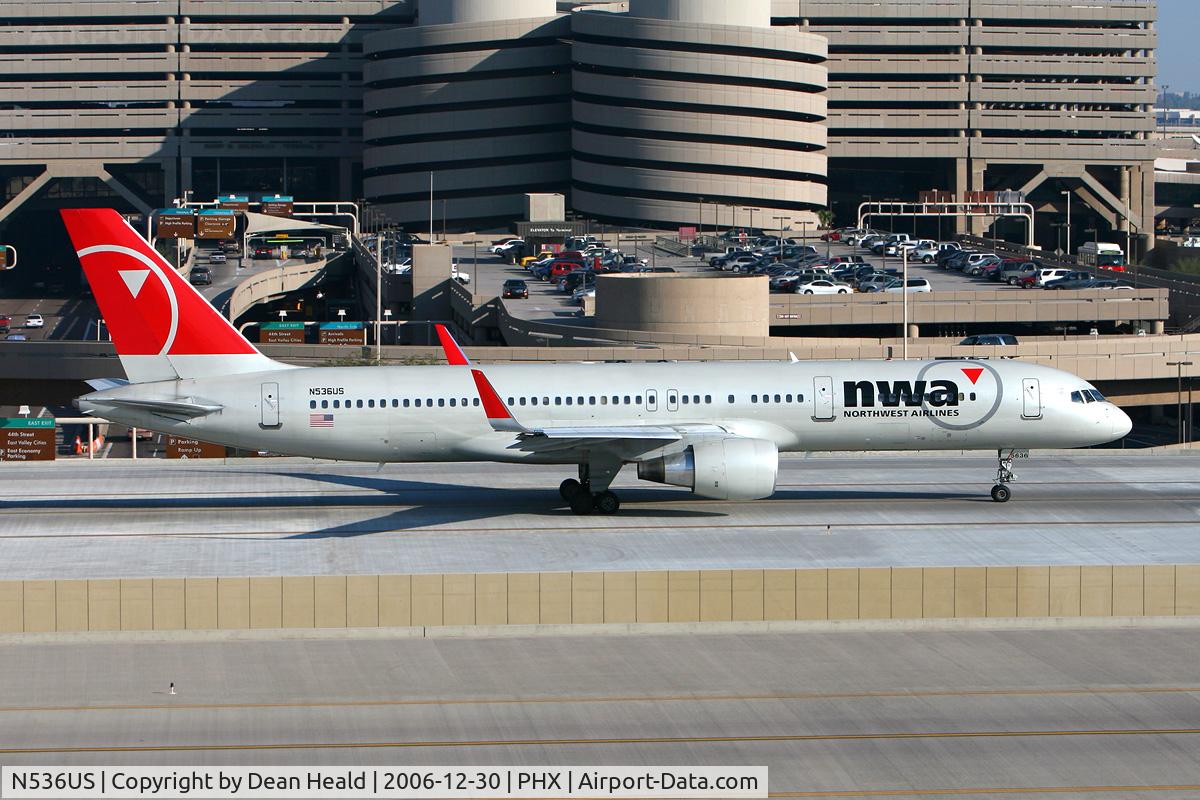 N536US, 1995 Boeing 757-251 C/N 26483, Northwest Airlines N536US (FLT NWA122), now with winglets, taxiing across the bridge for departure to Minneapolis St Paul Int'l (KMSP).