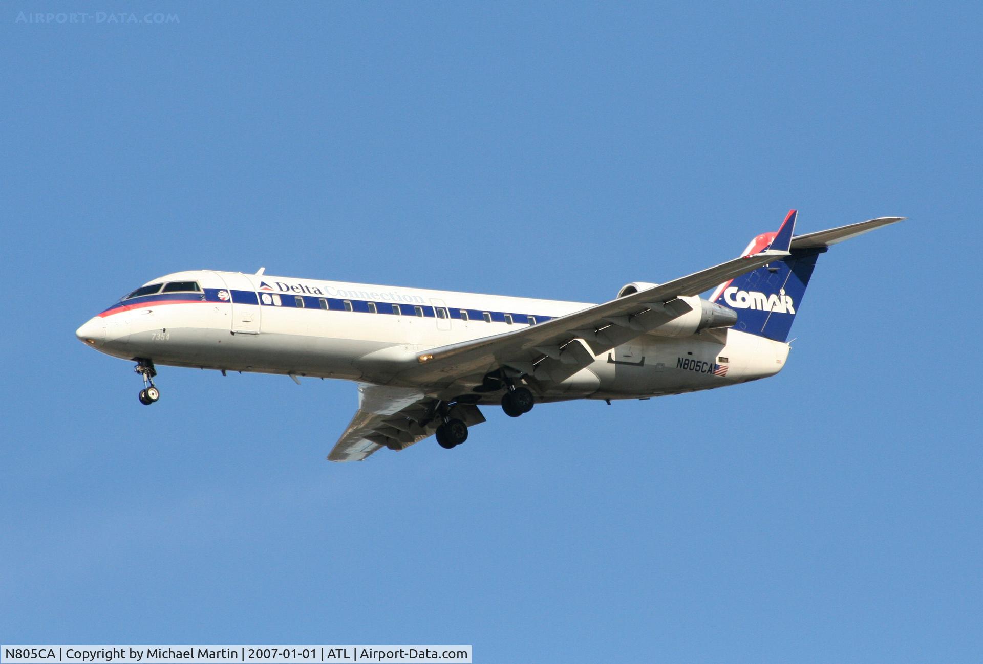 N805CA, 1999 Bombardier CRJ-100ER (CL-600-2B19) C/N 7354, On final for Runway 26L