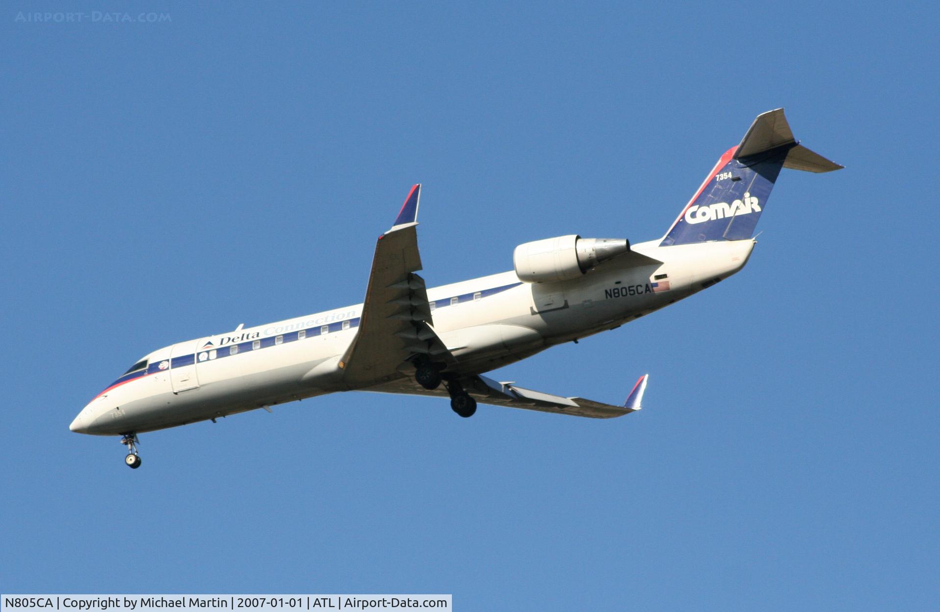 N805CA, 1999 Bombardier CRJ-100ER (CL-600-2B19) C/N 7354, Over the numbers of 26L