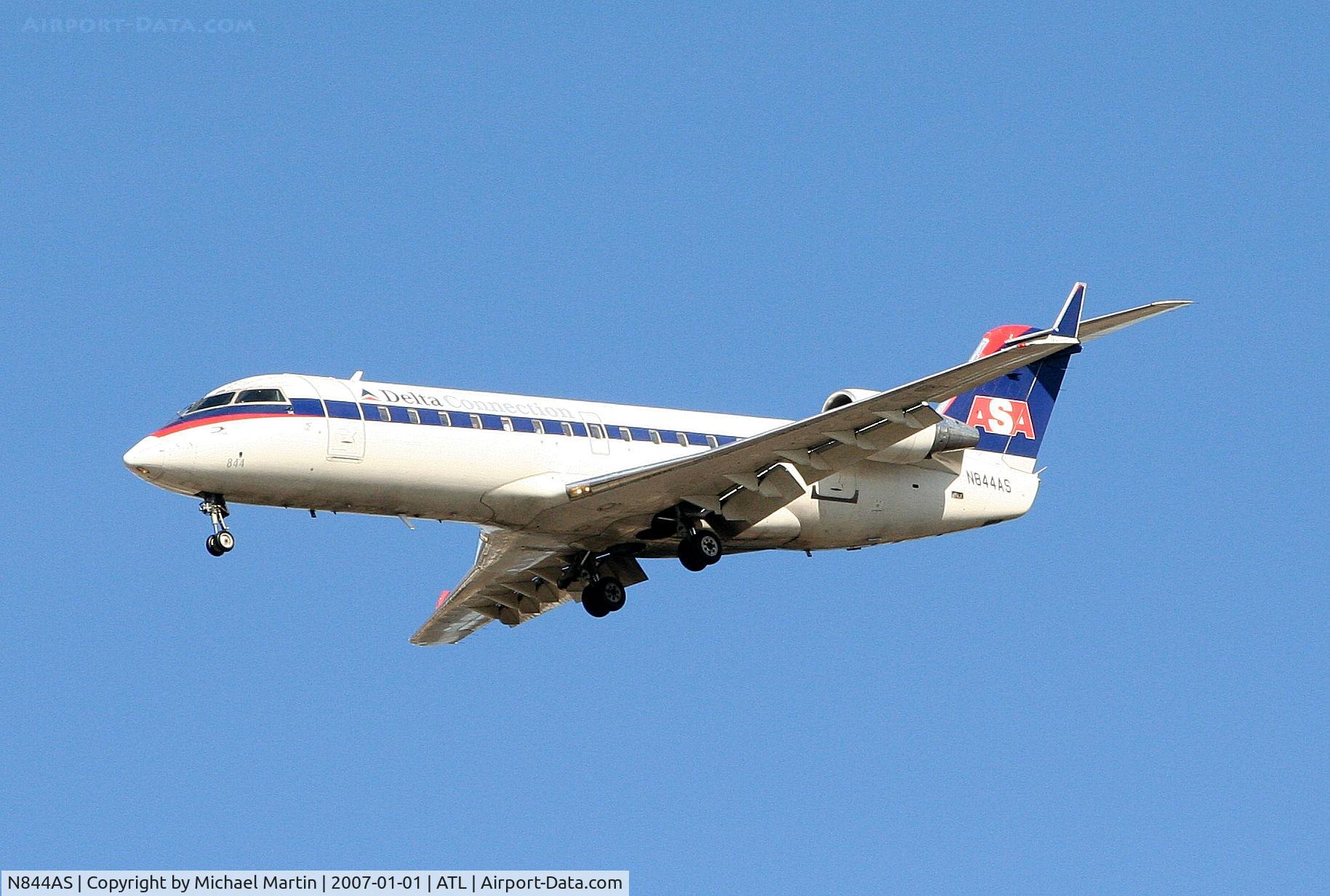 N844AS, 1999 Bombardier CRJ-200ER (CL-600-2B19) C/N 7317, On final for Runway 26L