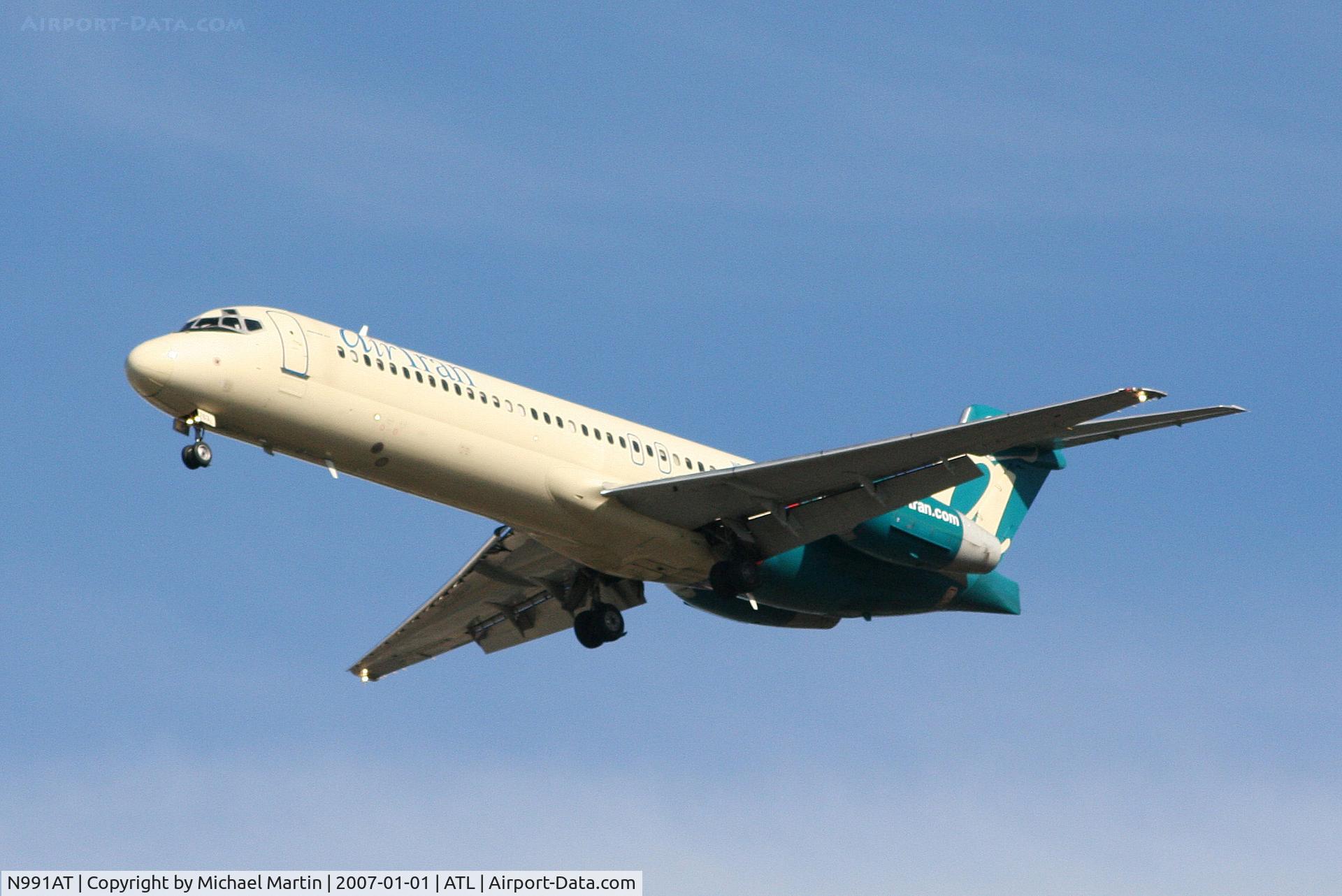 N991AT, 2002 Boeing 717-200 C/N 55135, On final for Runway 26L