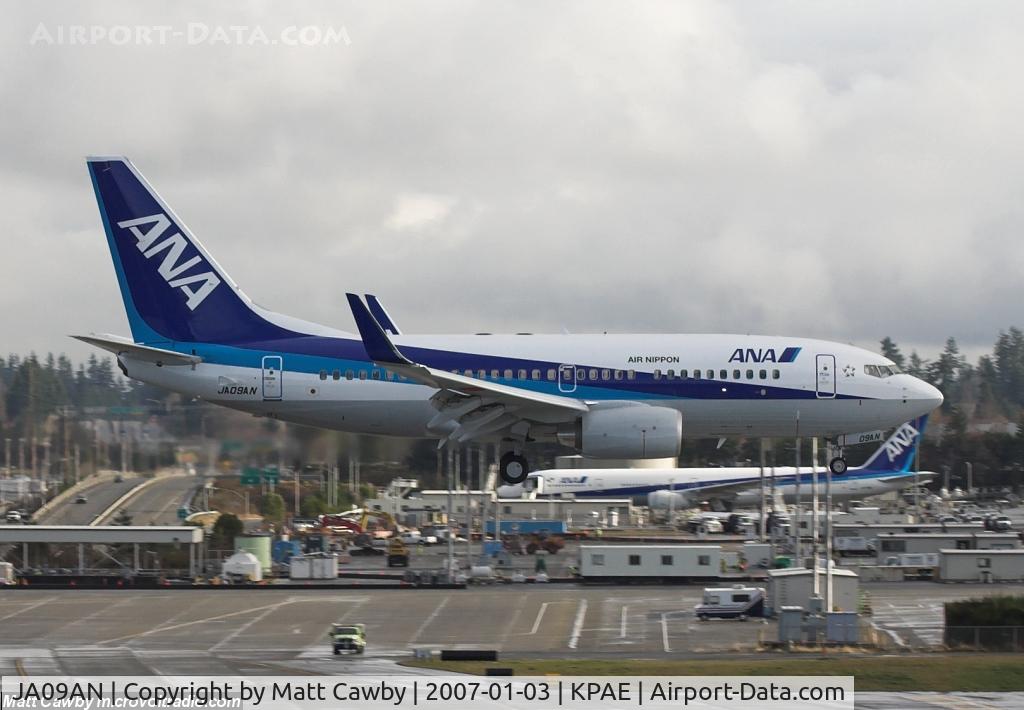 JA09AN, 2007 Boeing 737-781 C/N 33878/2145, Touch and go at Paine Field. JA778A in the background.