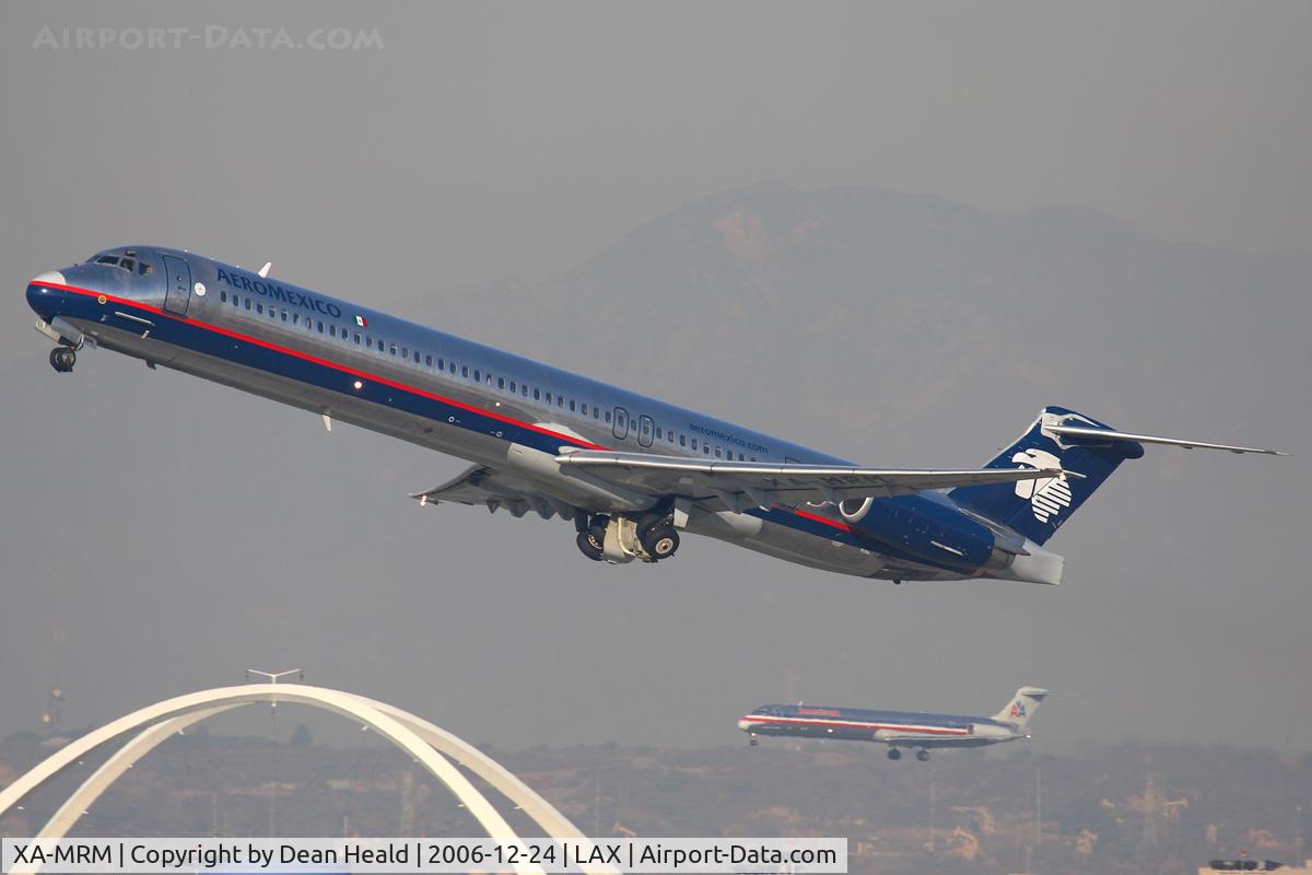 XA-MRM, 1991 McDonnell Douglas MD-82 (DC-9-82) C/N 53066, AMX647 climbing out from RWY 25R on a hazy Christmas Eve enroute to Mexico City.