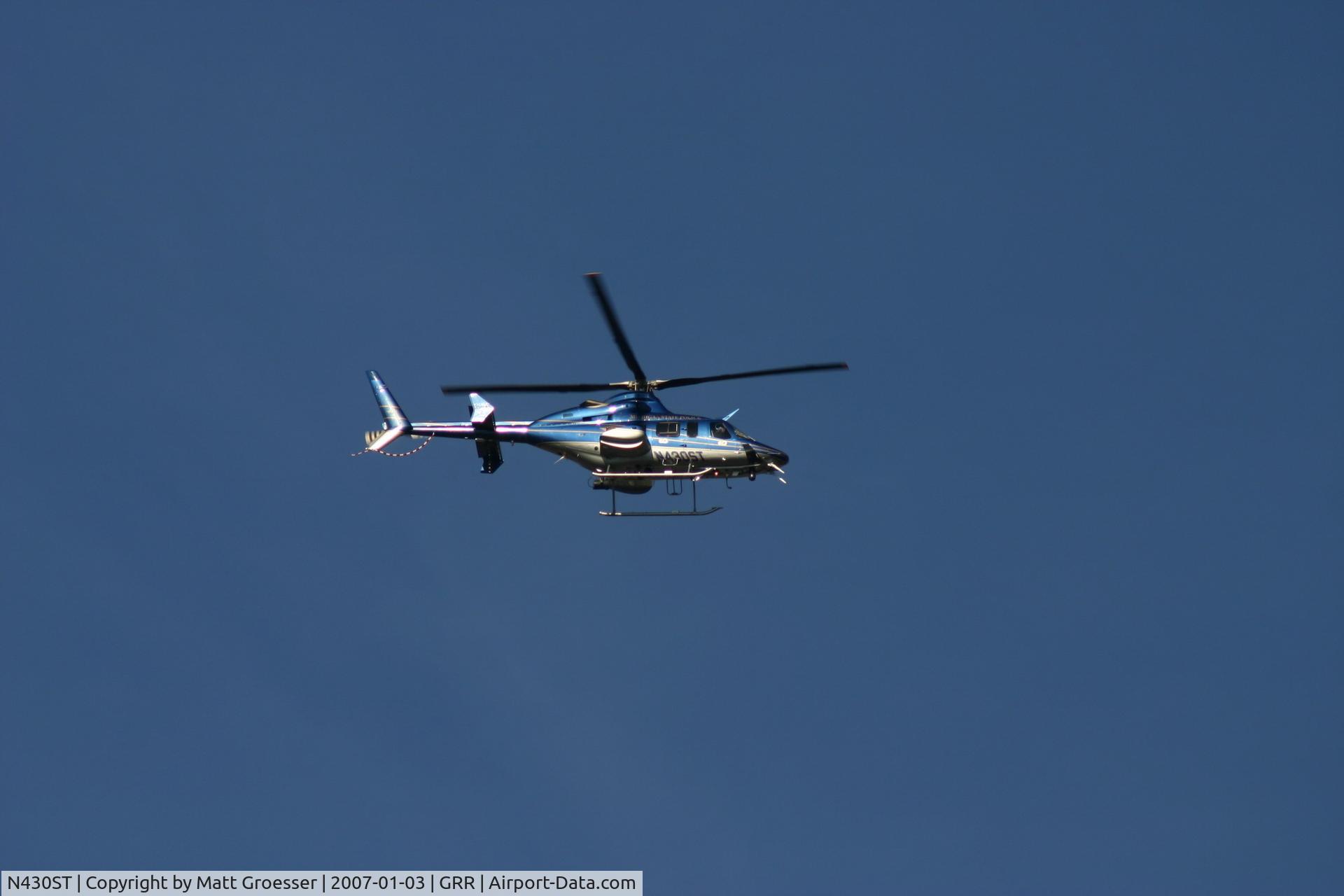 N430ST, 2000 Bell 430 C/N 49071, MSP helicopter over East Grand Rapids Church for Gerald R. Ford funeral security detail