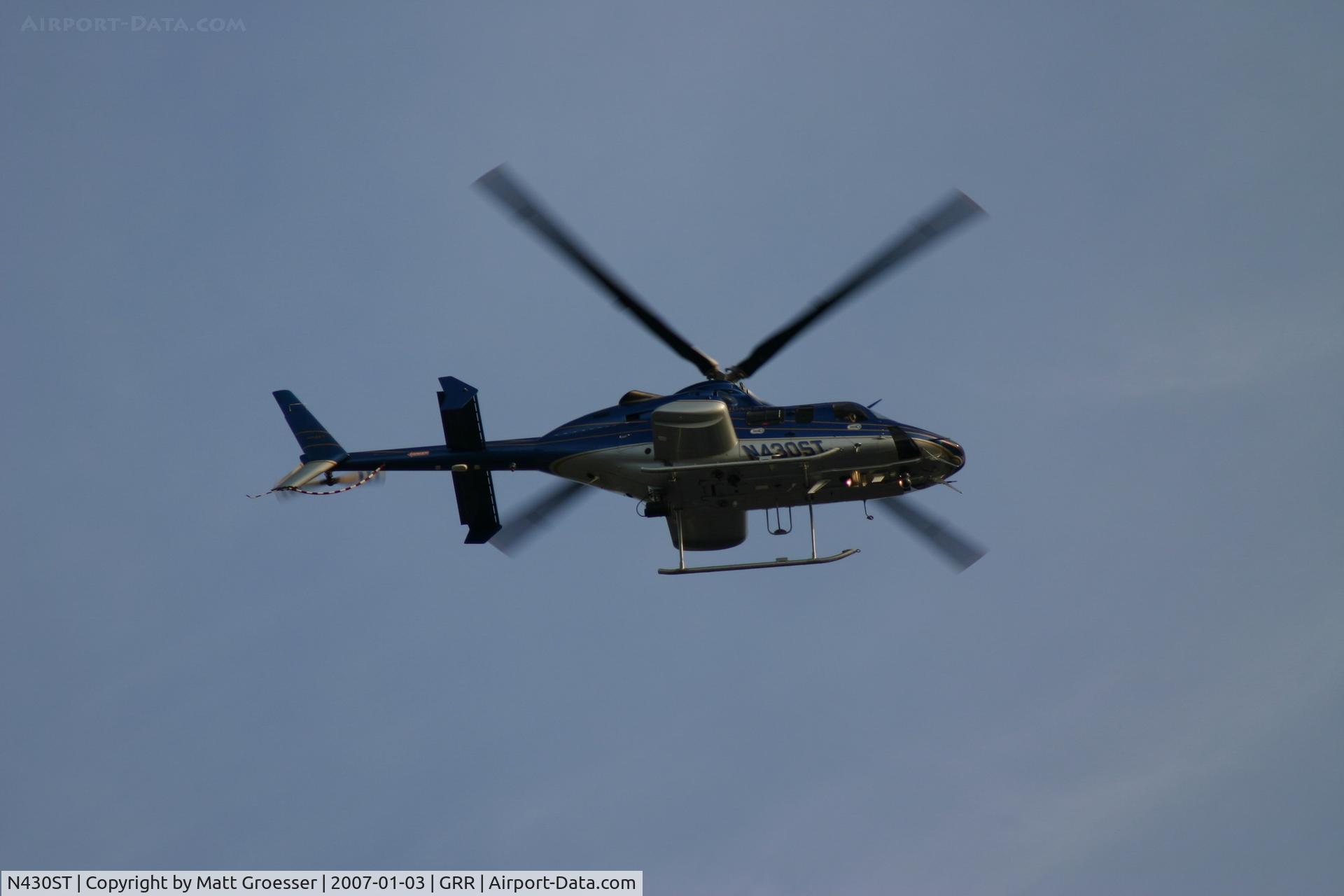 N430ST, 2000 Bell 430 C/N 49071, MSP helicopter over Grand Rapids for Gerald R. Ford funeral security detail