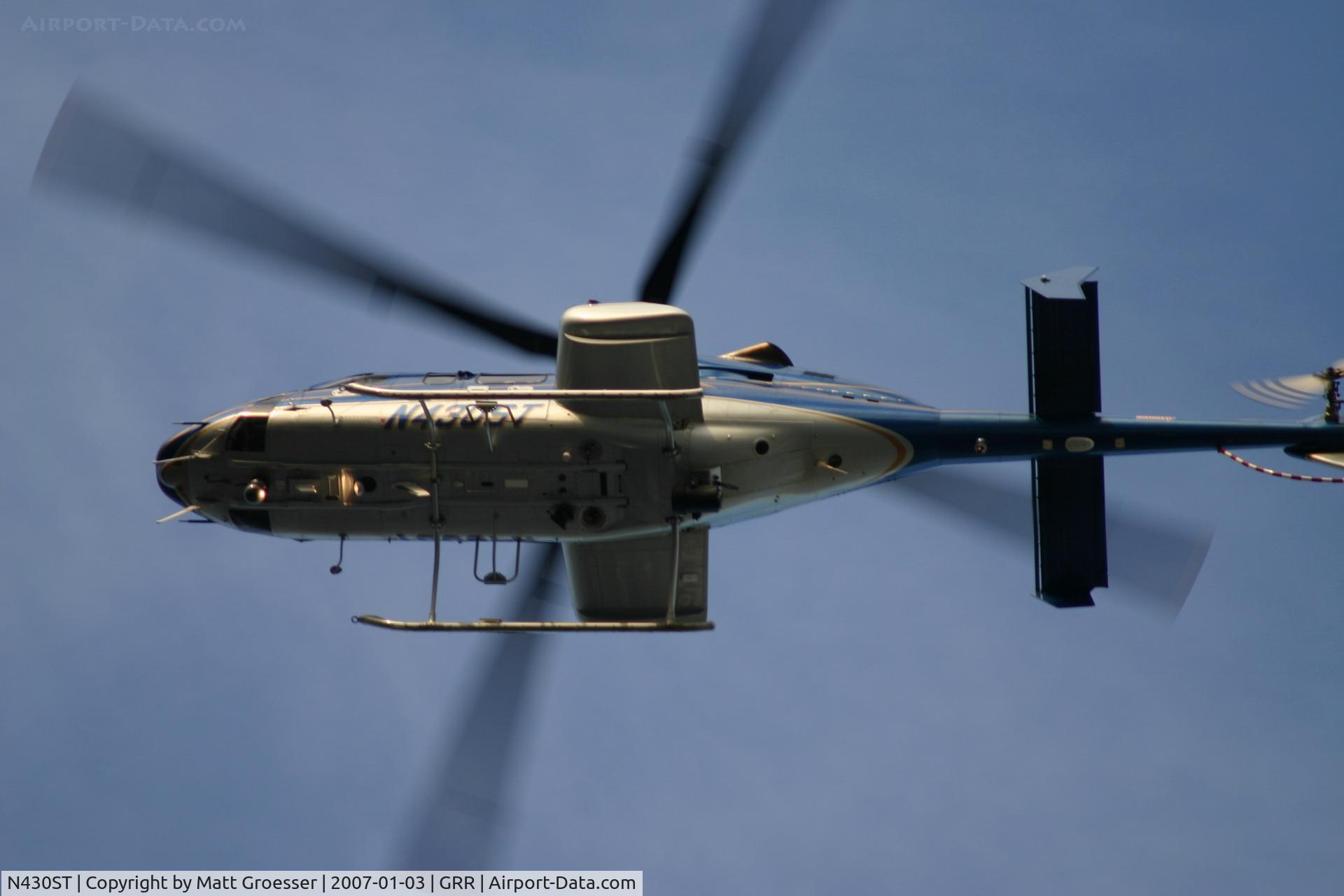 N430ST, 2000 Bell 430 C/N 49071, MSP helicopter over Grand Rapids, MI for Gerald R. Ford funeral security detail