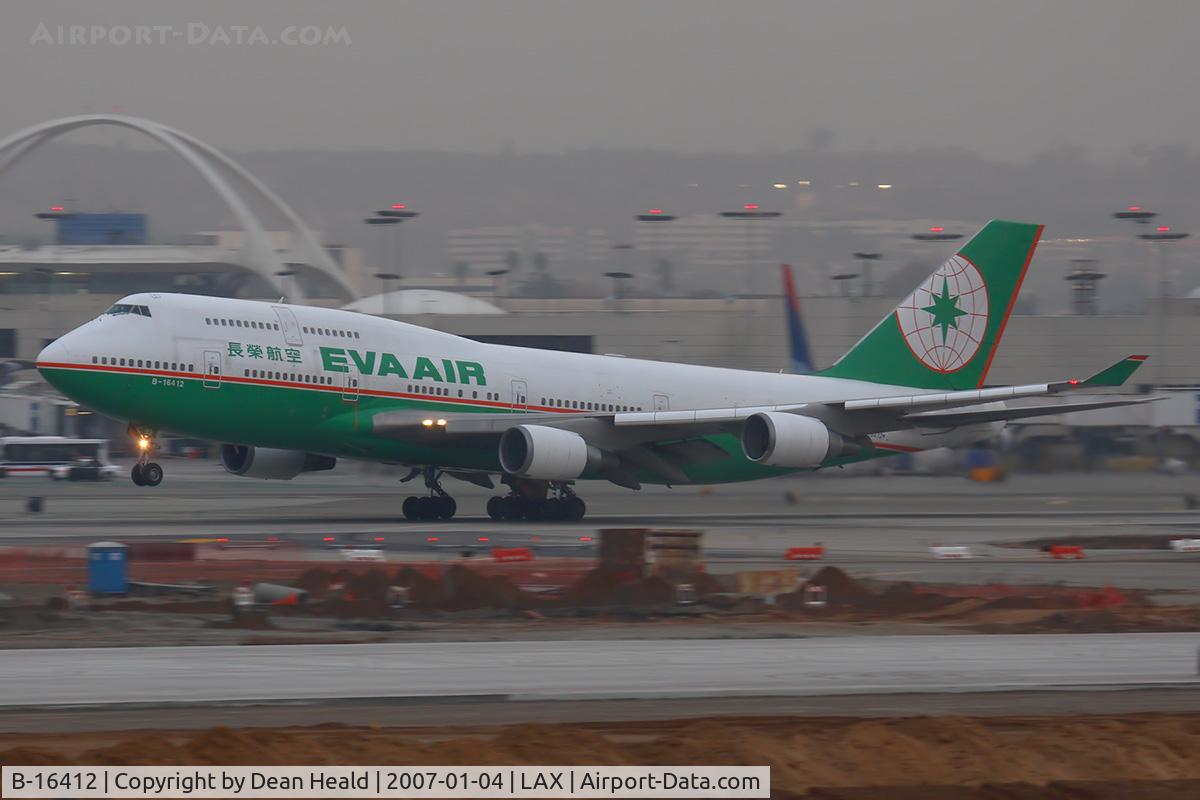 B-16412, Boeing 747-45E C/N 29112, EVA Air B-16412 (FLT EVA11) departing RWY 25R enroute to Chiang Kai Shek Int'l (RCTP) on a dreary January evening.