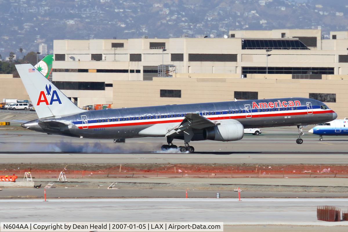 N604AA, 1995 Boeing 757-223 C/N 27055, American Airlines N604AA (FLT AAL1593) from Fort Lauderdale Hollywood Int'l (KFLL) touching down on RWY 7L in very windy conditions.