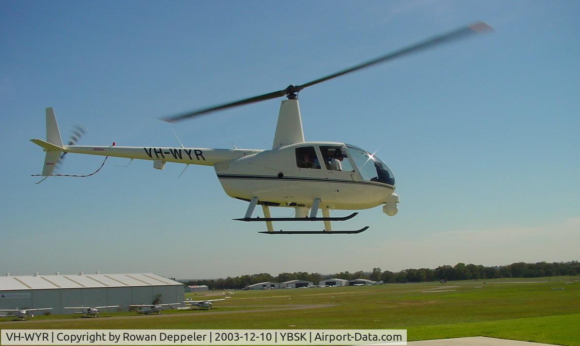 VH-WYR, 2003 Robinson R44 II C/N 10085, Vh-WYR Taxi from outside hangar at Bankstown