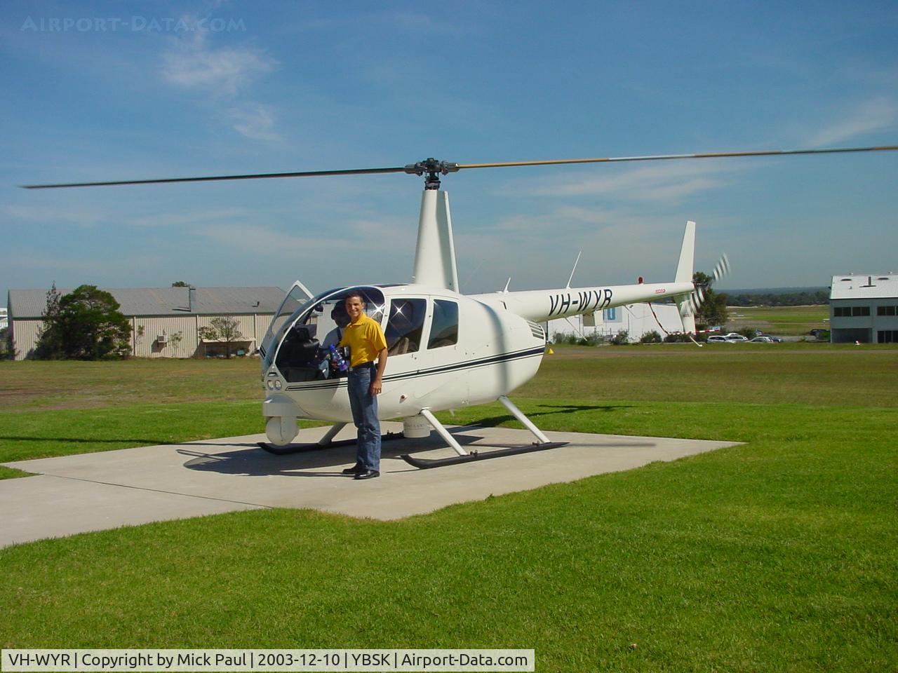 VH-WYR, 2003 Robinson R44 II C/N 10085, Vic Lorusso in front of ATN Chopper VH-WYR