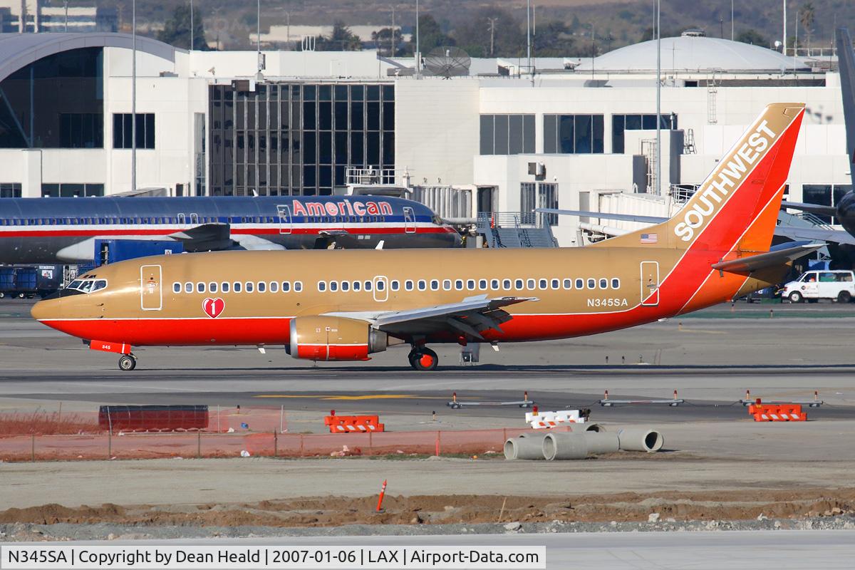 N345SA, 1987 Boeing 737-3K2 C/N 23786, Southwest Airlines N345SA (FLT SWA497) exitting RWY 25R after arrival from Tucson Int'l (KTUS).