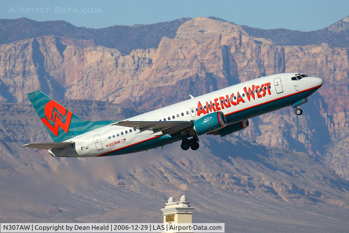 N307AW, 1990 Boeing 737-3G7 C/N 24634, US Airways (America West) N307AW (FLT AWE39) climbing out from RWY 01R enroute to Sacramento Int'l (KSMF).