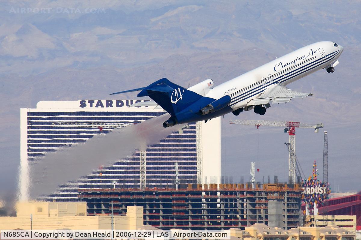 N685CA, 1981 Boeing 727-2S7 C/N 22492, Champion Air N685CA (FLT CCP405) climbing out from RWY 01R, in front of the closed Stardust Hotel & Casino, enroute to Minneapolis St Paul Int'l (KMSP).