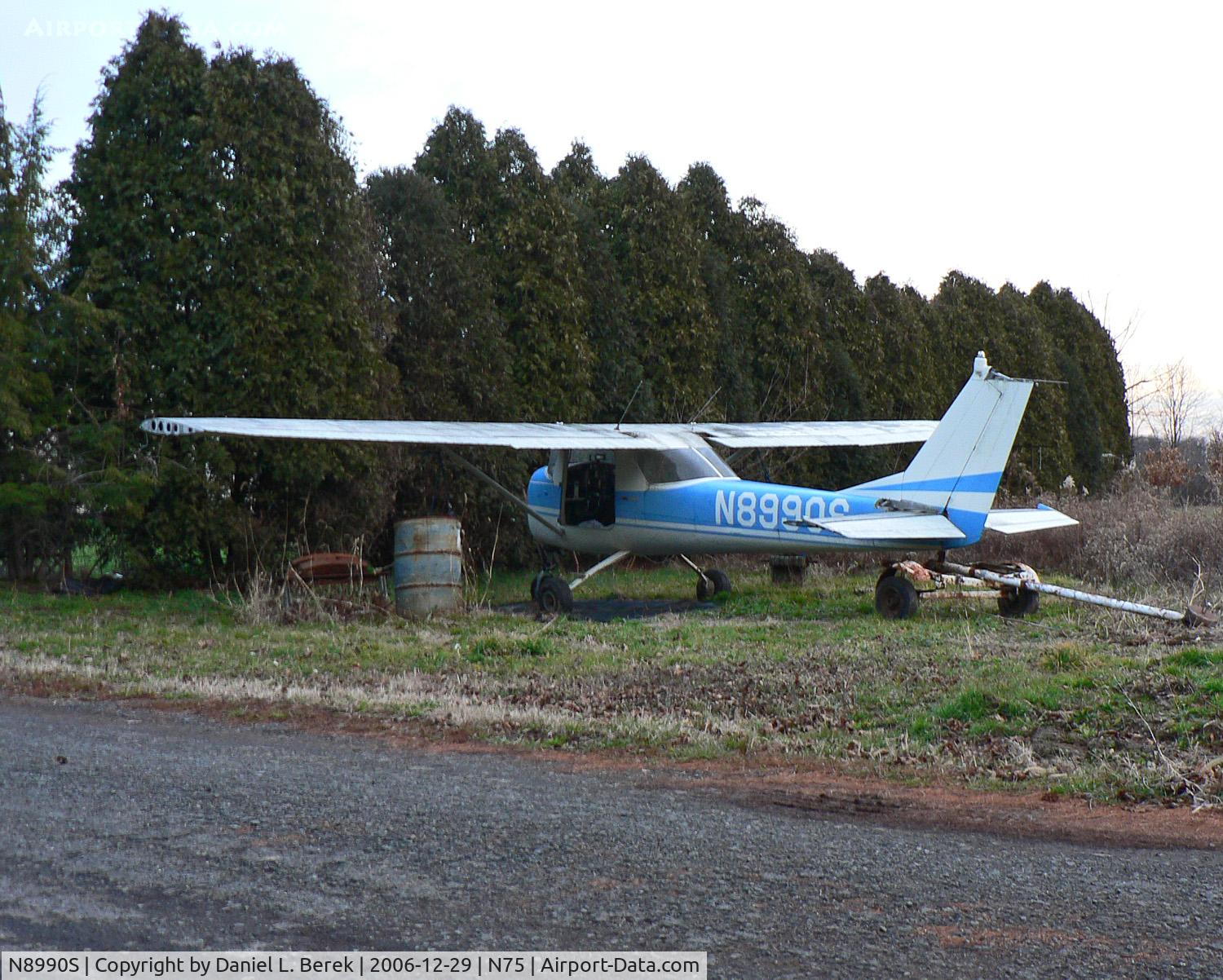 N8990S, 1965 Cessna 150F C/N 15062290, Parked in a driveway just off a side not far from Twin Pine's main turf runway was this 1965 Cessna 150 that had definitely seen better days.