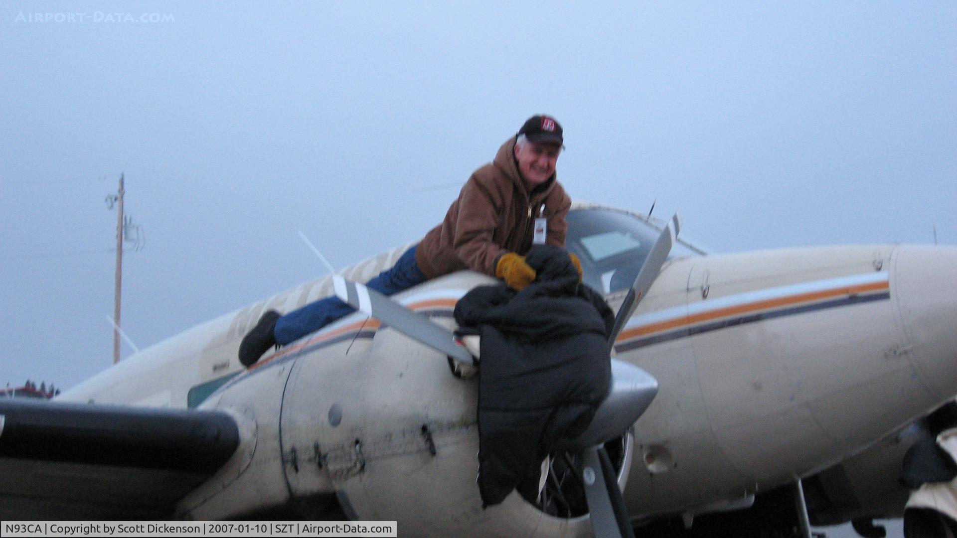 N93CA, 1962 Beech G18S C/N BA-604, Sleeping bags are stuffed inside the cowling to keep the engine warm in cold weather