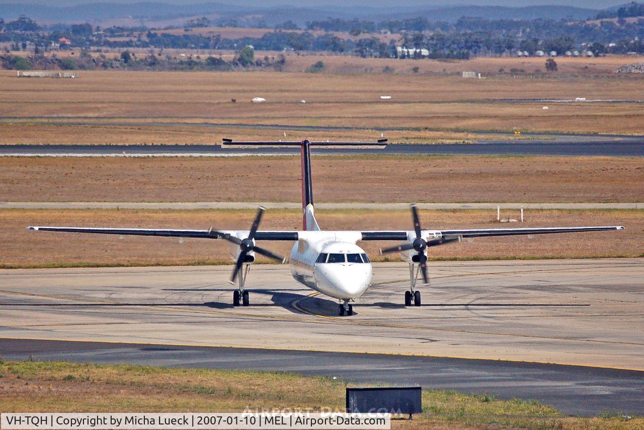 VH-TQH, 2003 De Havilland Canada DHC-8-315Q Dash 8 C/N 597, Taxiing to the parking position