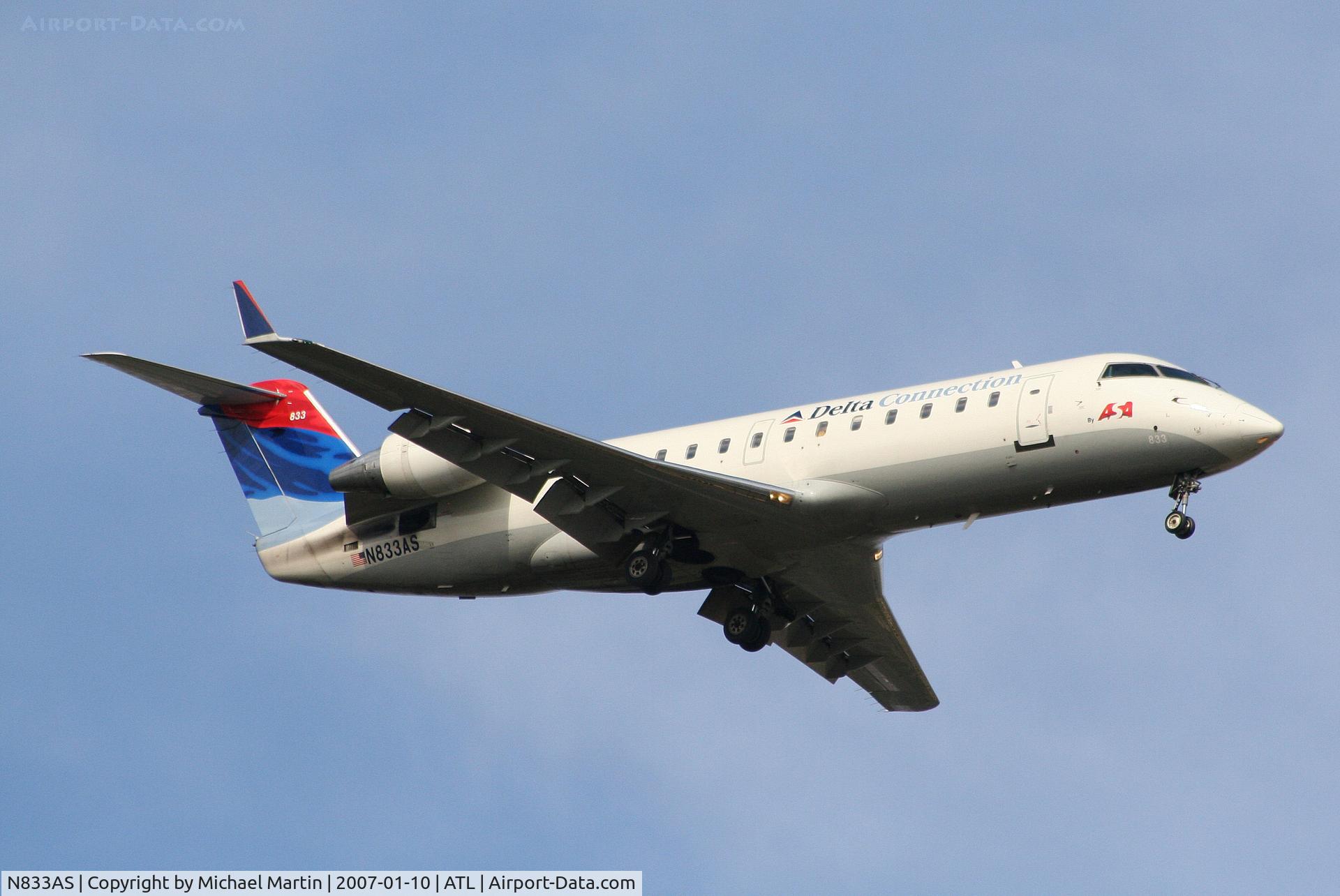 N833AS, 1998 Bombardier CRJ-200ER (CL-600-2B19) C/N 7246, On final for Runway 9R