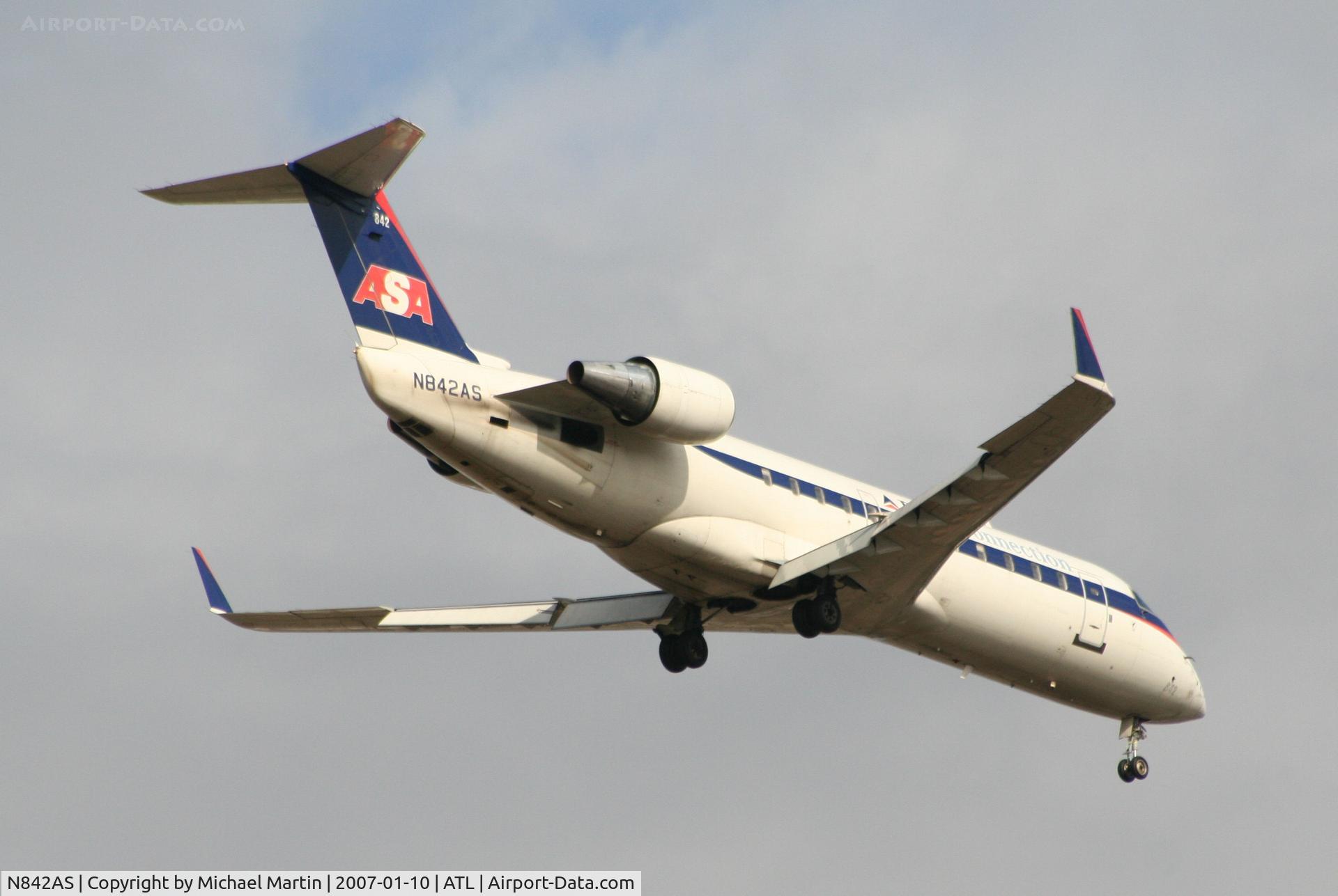 N842AS, 1999 Bombardier CRJ-200ER (CL-600-2B19) C/N 7304, Over the numbers of 9R