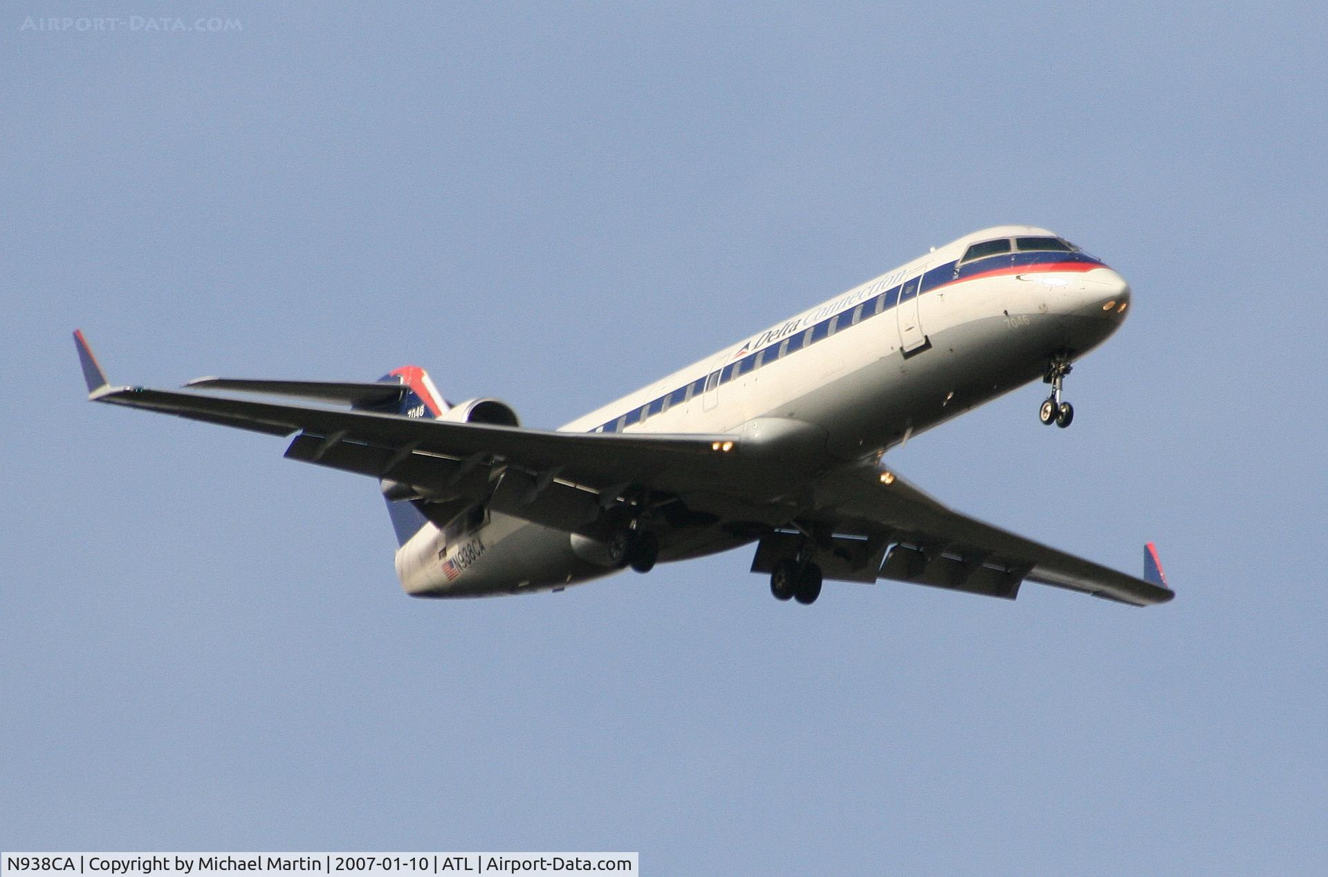 N938CA, 1994 Canadair CRJ-100ER (CL-600-2B19) C/N 7046, On final for Runway 9R