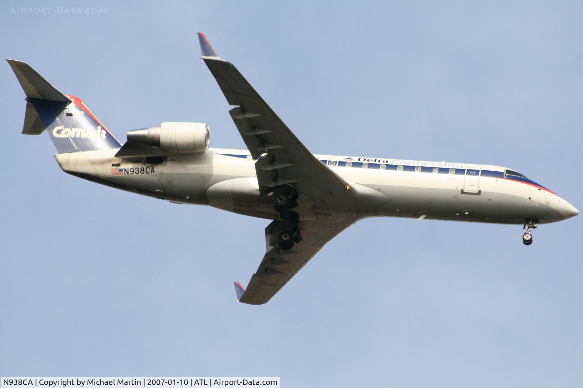 N938CA, 1994 Canadair CRJ-100ER (CL-600-2B19) C/N 7046, On final for Runway 9R