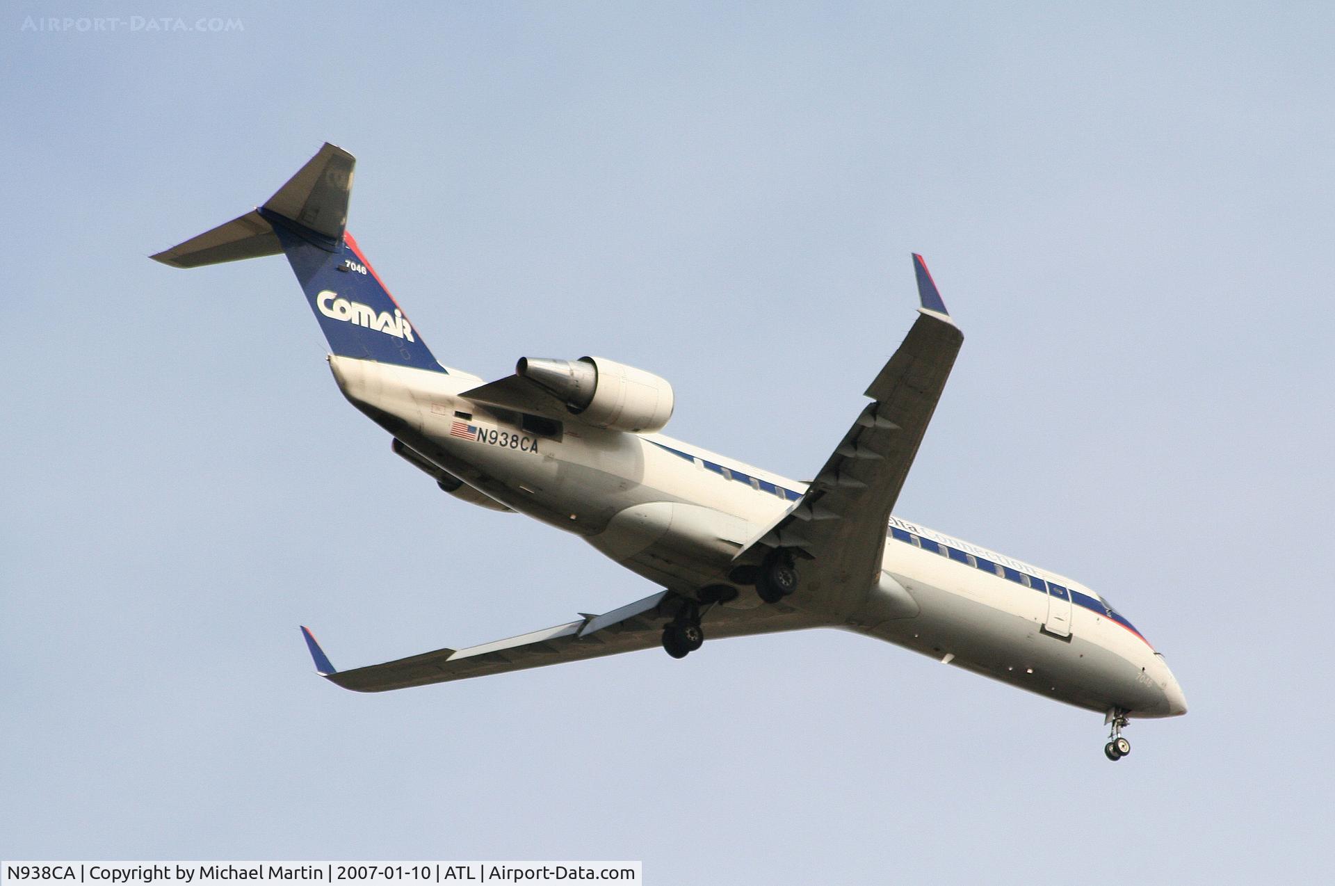N938CA, 1994 Canadair CRJ-100ER (CL-600-2B19) C/N 7046, Over the numbers of 9R