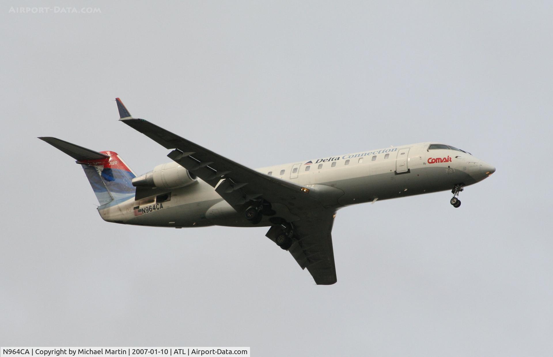 N964CA, 1996 Canadair CRJ-100ER (CL-600-2B19) C/N 7129, On final for Runway 9R