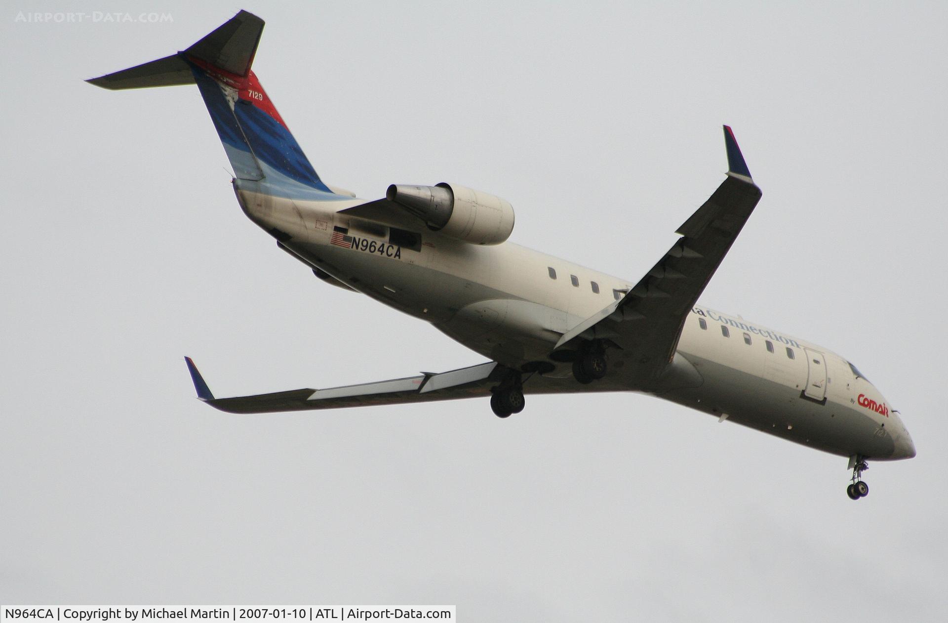 N964CA, 1996 Canadair CRJ-100ER (CL-600-2B19) C/N 7129, Over the numbers of 9R