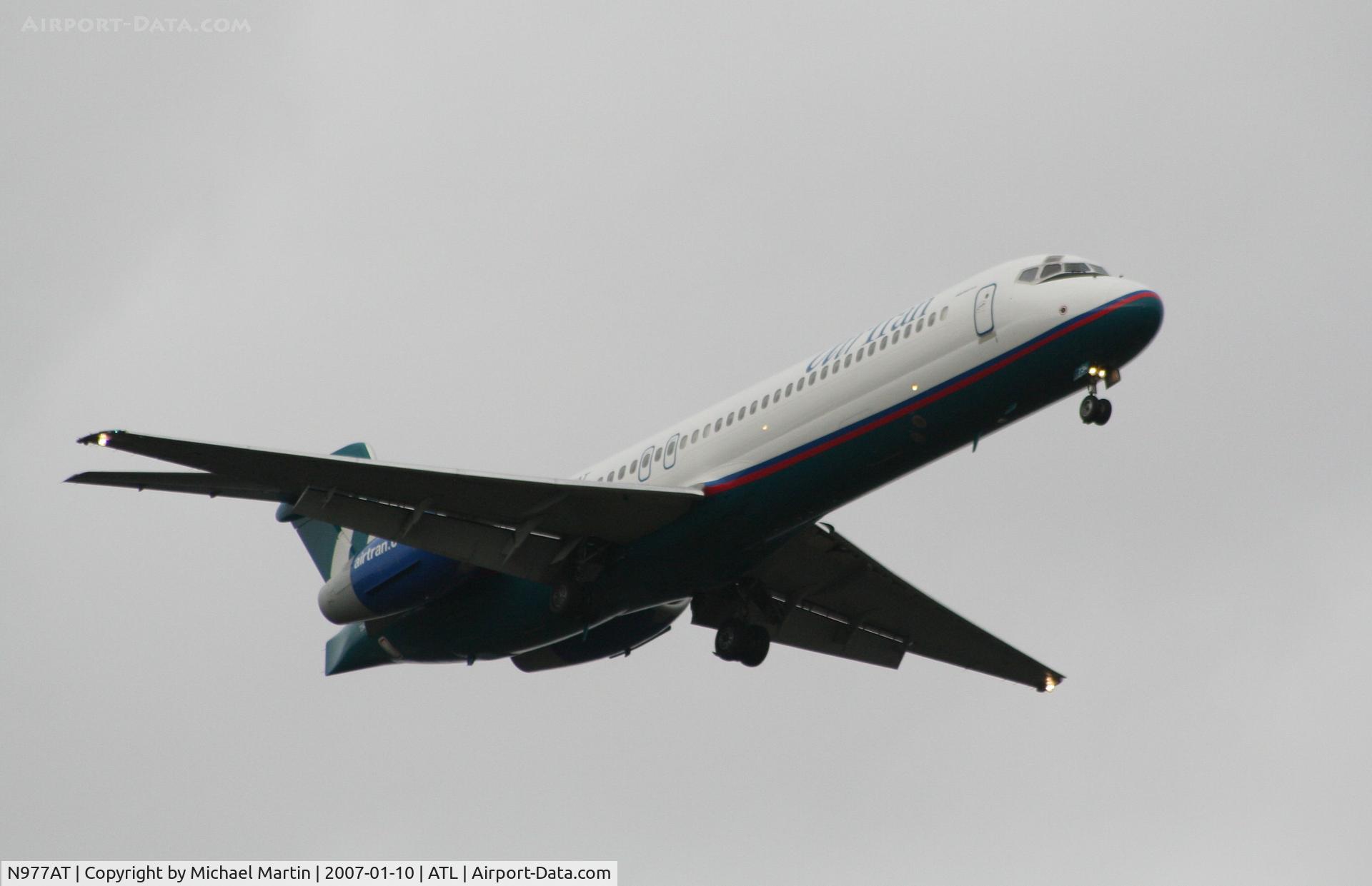 N977AT, 2002 Boeing 717-200 C/N 55036, On final for Runway 9R