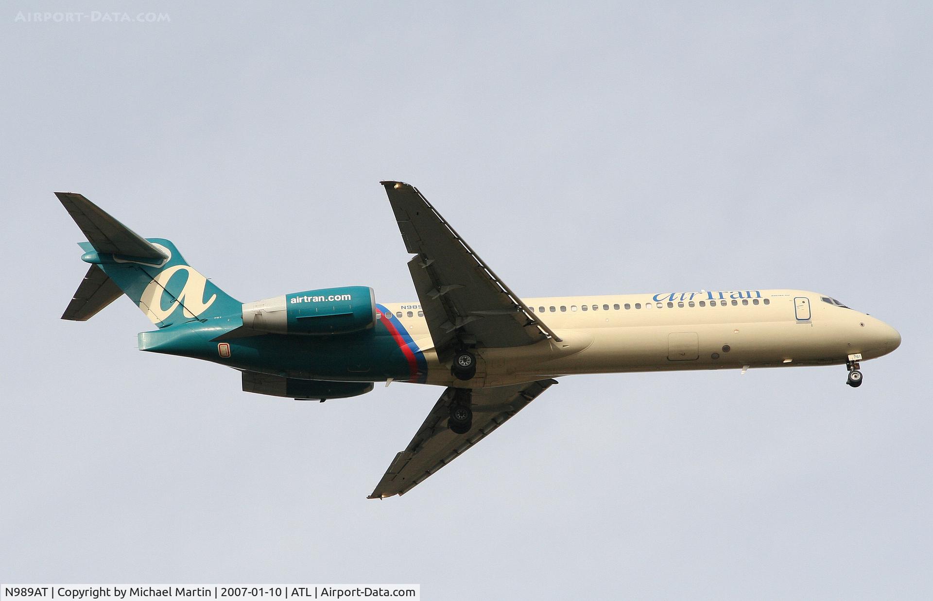 N989AT, 2001 Boeing 717-200 C/N 55152, On final for Runway 9R