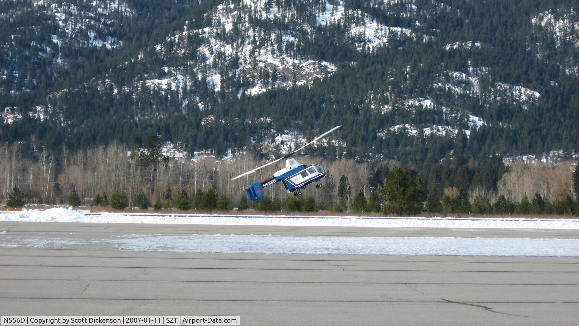 N556D, 1959 Kaman HH-43B C/N 37, HH-43B Kaman practicing autorotations before logging season begains.