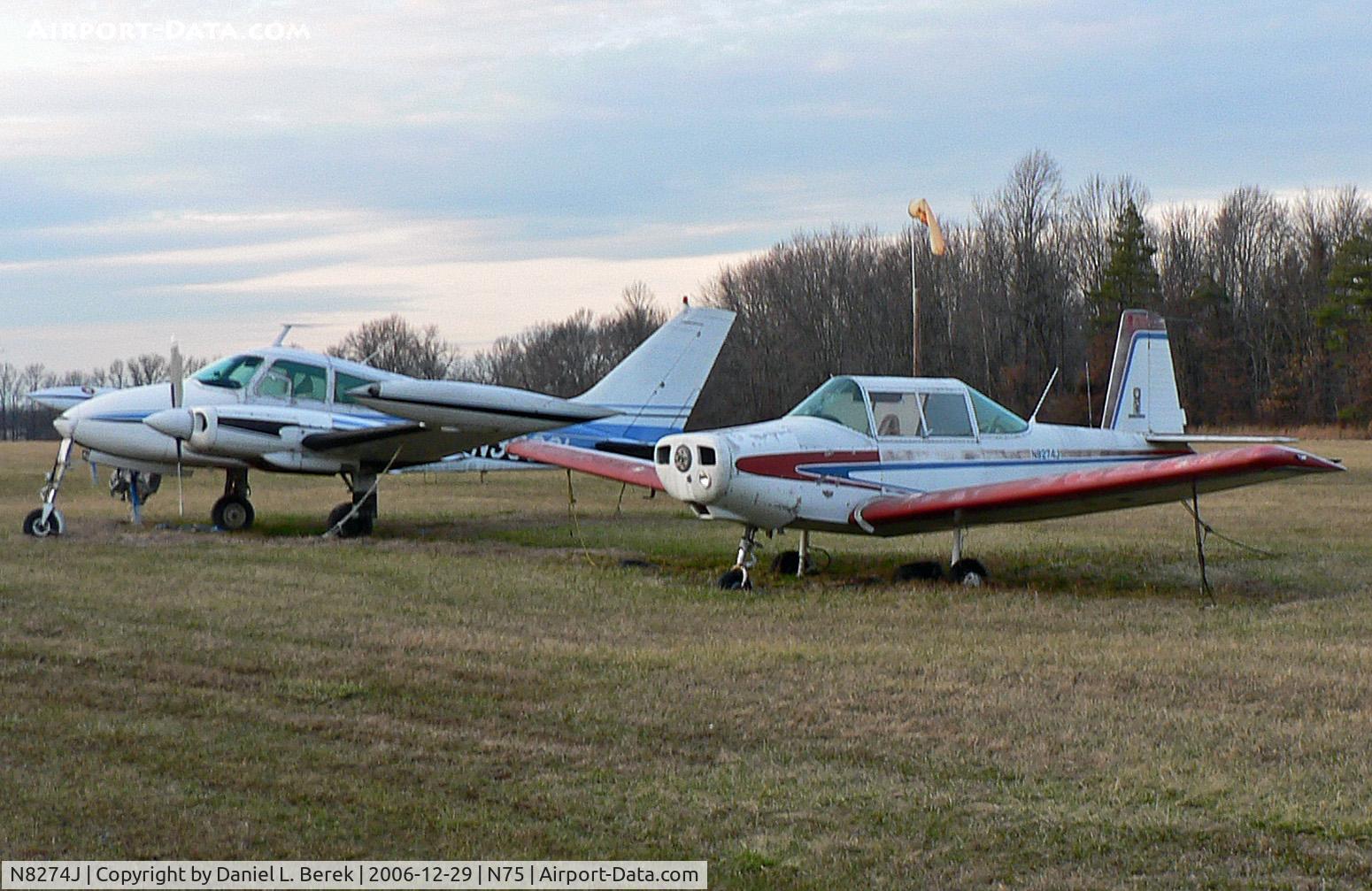 N8274J, 1979 Varga 2150A Kachina C/N VAC-120-79, With a similarly afflicted Cessna in the background, this classic Varga Kachina has sat it out for several years now with engine trouble at Twin Pine.