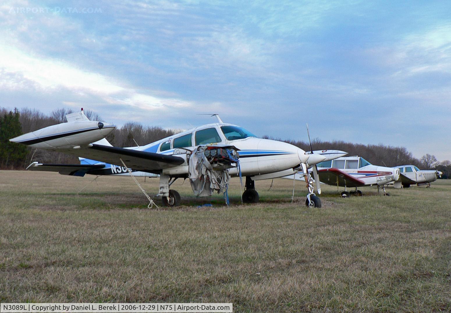 N3089L, 1965 Cessna 310J C/N 310J0089, A 1965 Cessna 310J with engine trouble and peeling paint heads up a line of similarly afflicted aircraft at Twin Pine Airport.